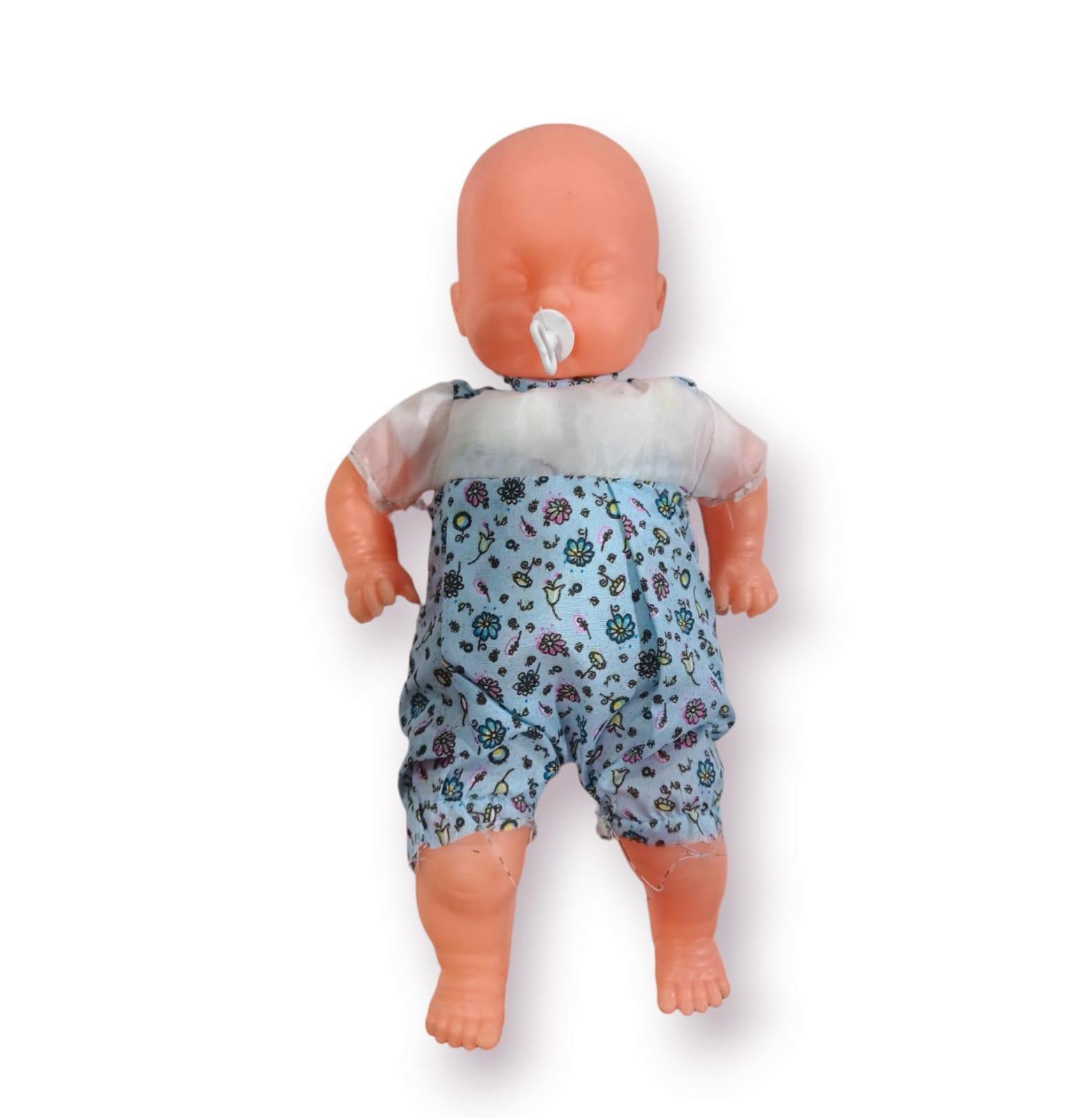 BEBE DORMIDO CON ROPITA Y CHUPETE EN BOLSA